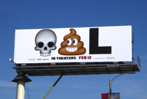 Billboard with an emoji skull, and emoji poop, and the letter "L"